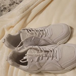 White Steve Madden sneakers.